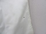 a close up of a piece of fabric with a hole in it