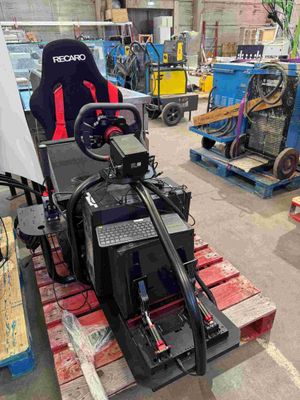 an image of a car being built in a factory