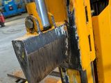 a close up of a forklift with a fork on it