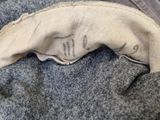 a close up of a person ' s face on a blanket