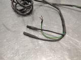 a wire that is sitting on a metal surface