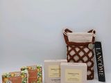 an assortment of soaps, soap bars and soap bars in a basket on a white background