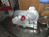 a machine that is sitting on a table in a kitchen