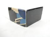 an image of a black and blue belt with a wooden buckle