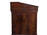 a small wooden podium with a door on top of it