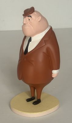 une figurine représentant un homme en costume-cravate