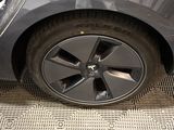 a close up of a tire on a car