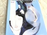 a blue book with a picture of a woman and a cat on it
