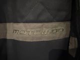 an image of a close up of a jacket with a label on it
