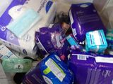 a pile of toilet paper and tissues in a box