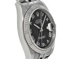 a close up of a wrist watch with roman numerals on it