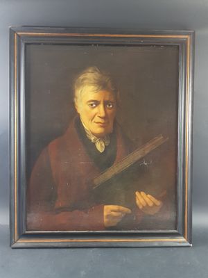 portrait of an old man holding a book in a frame