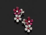 une paire de boucles d'oreilles en rubis et diamants
