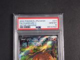 the pokemon card is in a clear plastic holder on a black surface
