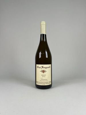 an image of a bottle of wine sitting on top of a table