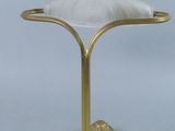 an image of a gold lamp with a white shade on top of it