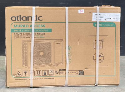 two boxes of air conditioners are stacked on top of each other