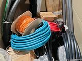 a box full of different types of hoses and other items