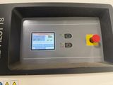 a close up of a machine with a button on it