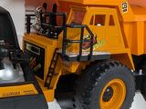 a toy truck that is sitting on top of a shelf