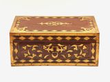 an image of a wooden box with a decorative design on it