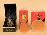 two perfume bottles in a box and a perfume bottle in a box