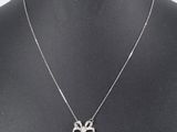a close up of a necklace on a mannequin mannequin