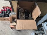 a box of tools and a box of chains on the floor