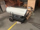 a large white proprigerator sitting in a warehouse