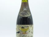 a bottle of wine that is sitting on a table