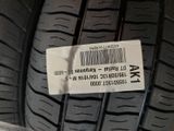the tire of a car is shown with a price tag on it