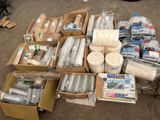 a lot of items that are in boxes on the ground