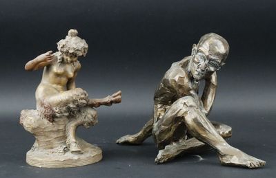 paire de figurines anciennes en bronze représentant un homme et une femme