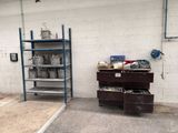 a garage with a lot of shelves and drawers in it