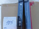 a pair of skis sitting in a box with a price tag