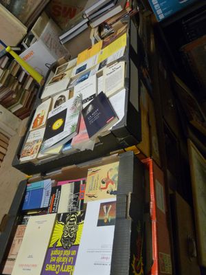 a stack of books sitting on top of each other