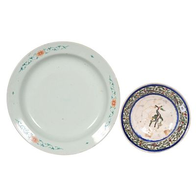 a plate and a plate with a picture of a bird on it