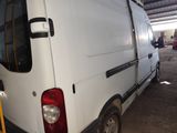 a white van that is parked in a garage
