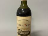 a bottle of wine that is sitting on a table