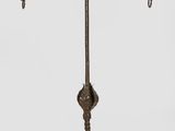 wrought iron candelab with five candelabs on a stand