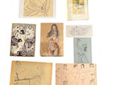a lot of drawings on a piece of paper on the table