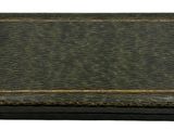 an old book with a leather cover on a white background