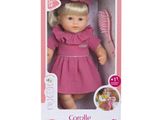doll with blonde hair and pink dress in a pink box