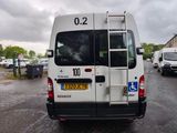 a white van that is parked in a parking lot