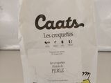 a bag of cat litter sitting on a counter
