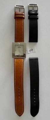 three different types of watches are displayed on a white surface