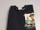 a close up of a shirt with a picture of a person on it