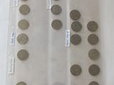a lot of coins in a plastic bag on a table