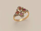 an image of a gold and diamond ring