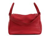 a red handbag on a white background